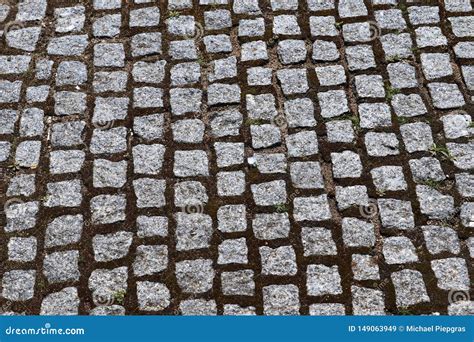 Close Up Detailed View On A Cobblestone Street Pavement In High