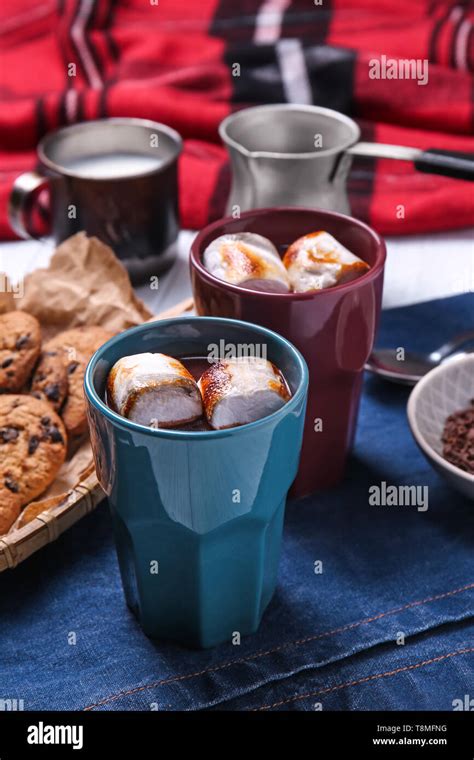 Cups Of Hot Chocolate With Marshmallows On Table Stock Photo Alamy