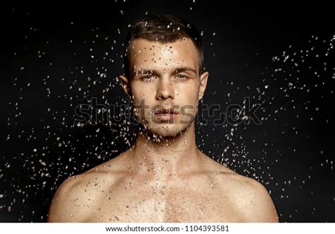 Hydrated Male Portrait Water Splash Drops Foto Stock 1104393581