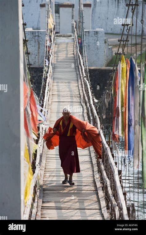 Monk Crossing Bridge Bhutan Hi Res Stock Photography And Images Alamy