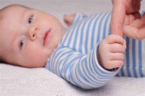 Why Do Babies Close Their Fists So Tightly Around Your Fingers