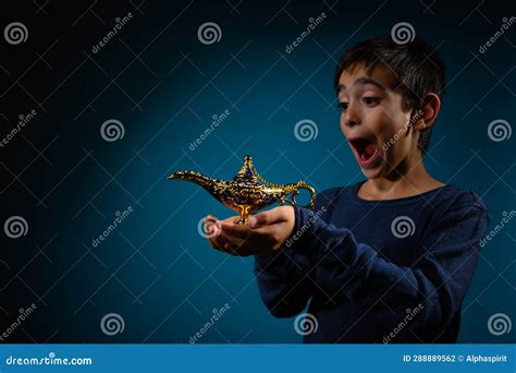 Amazed Child With Magic Aladin Lamp In Hand Stock Photo Image Of