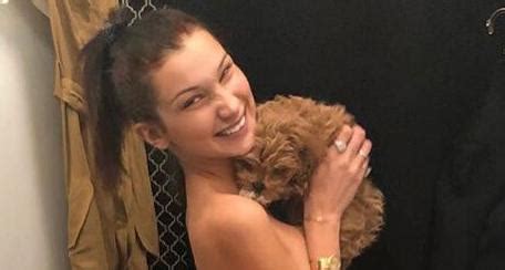 Bella Hadid Debuts New Puppy In Naked Instagram Post