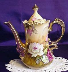 Handpainted American Beauty pattern coffee pot.