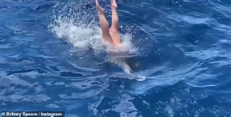 Britney Spears Wows In A Skimpy Neon Bikini After Going Topless To Tan Daily Mail Online