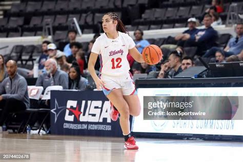 Liberty Flames And Lady Flames Photos And Premium High Res Pictures