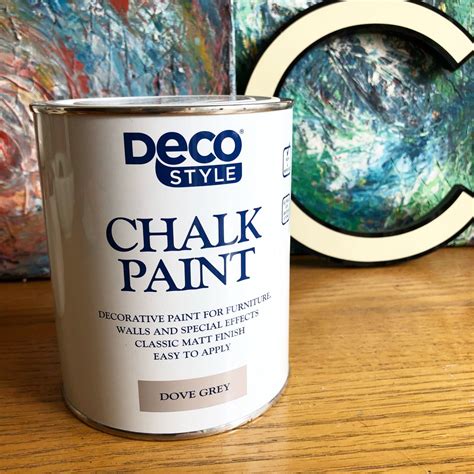 Tin Of Aldi Chalk Paint On Wooden Surface With Art Work Behind Chalk Paint Wall Painting