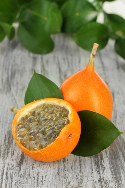 Premium Photo Passion Fruits On Table Closeup