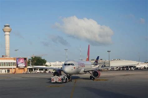 How to get from Isla Mujeres to Cancun Airport, Mexico