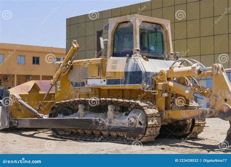 Old Dirty Extremely Heavy Bulldozer Arrived To Repair Station Yellow