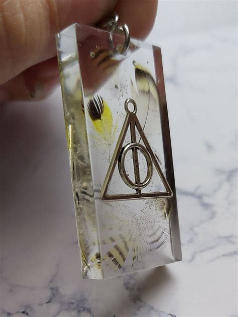 Harry Potter Silver Charm Set In Resin With Real Feathers Harry