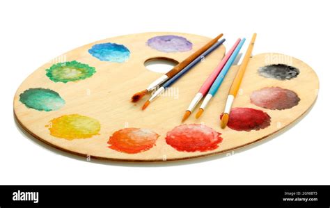 Wooden Art Palette With Paint And Brushes Isolated On White Stock Photo