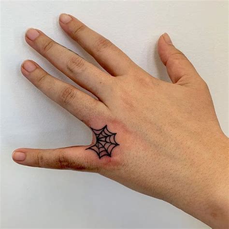 Pin By La Flame On Yatted Finger Tattoos Small Hand Tattoos Web Tattoo