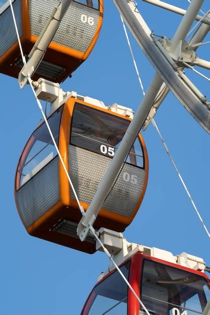 Premium Photo Closeup Of Colorful Cabins Of Giant Ferris Wheel In