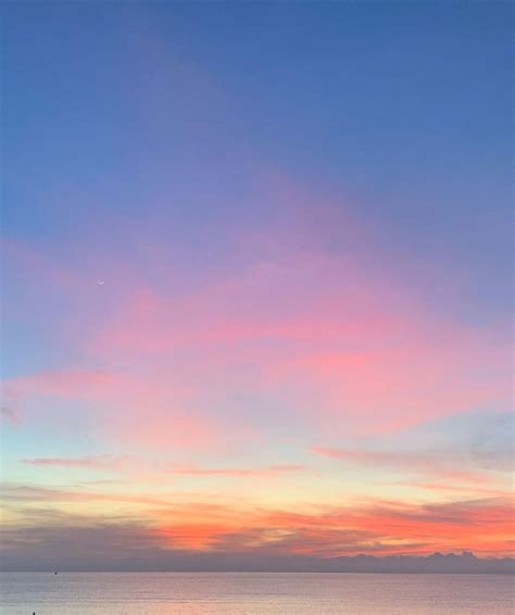 The Sky Is Pink And Blue At Sunset