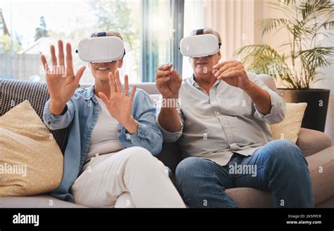 Senior Couple And Vr Technology For Metaverse Retirement Fun And