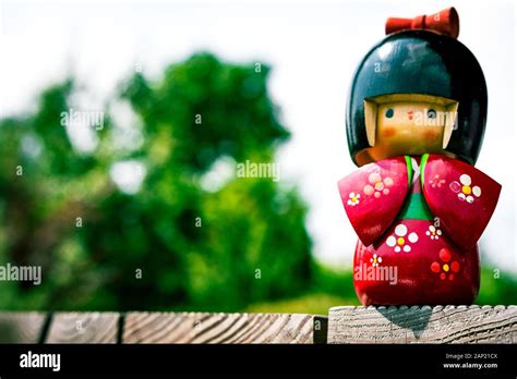 Wooden Japanese Kokeshi Doll Dressed In Traditional Kimono Hand