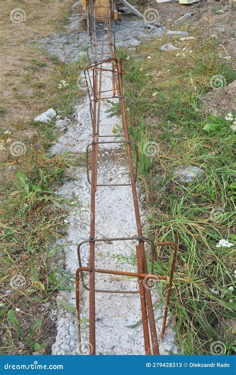 Building Concrete Foundation For Fence With Reinforcing Bars Steel