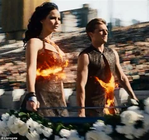 Watch Katniss And Peeta Fake It For The Cameras In First Hunger Games Catching Fire Tv Spot