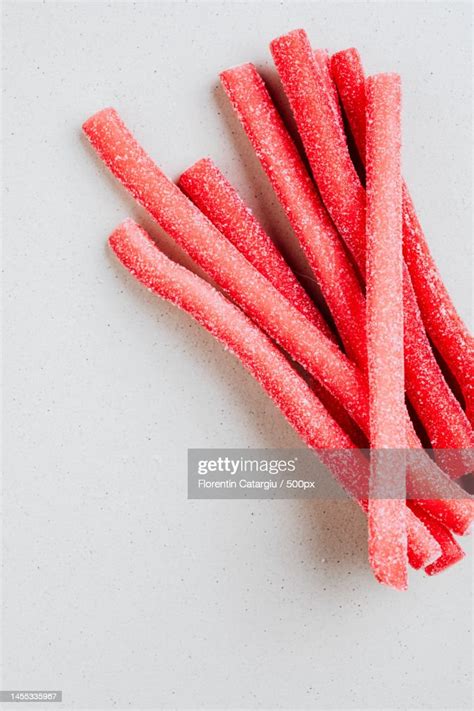 Red Chewy Candies Coated With Sugar Romania High Res Stock Photo