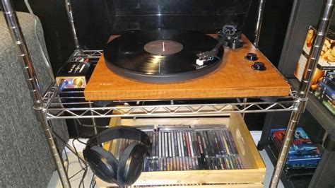 My budget turntable setup. Had it for a year now, really happy with it. I do plan of upgrading ...