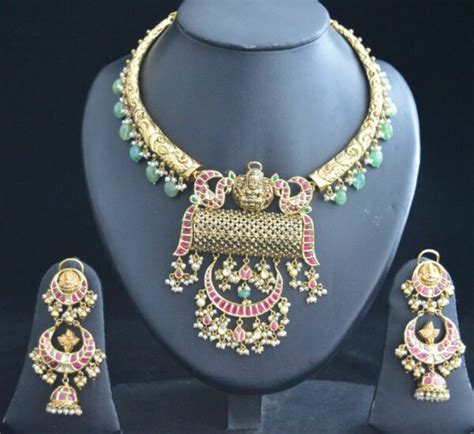 Antique Gold Kante Nakshi Necklace And Jhumkas