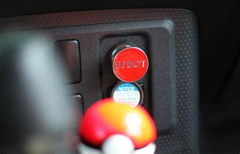 Fake Eject Button For Your Car Fits Into Your Cigarette Lighter