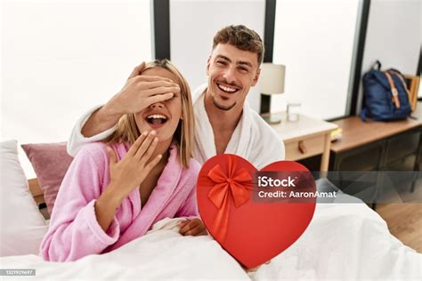 Man Surprising His Girlfriend With Valentine T Box Sitting On The