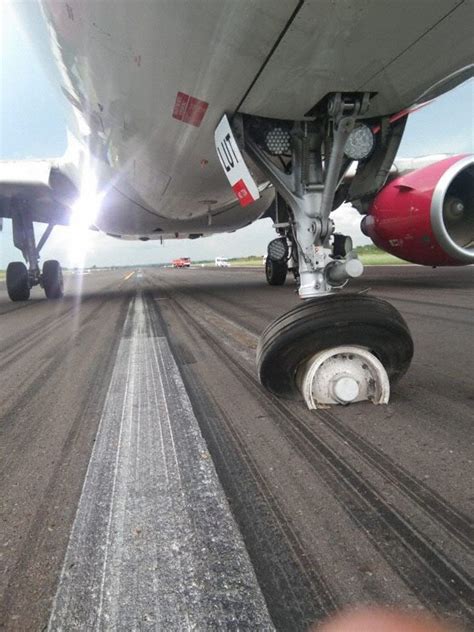 A Batik Air Airbus A320 lands with nose wheel rotated sideways