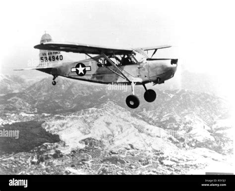 An undated aerial photo of a Stinson L-5 wearing US Air Force markings ...