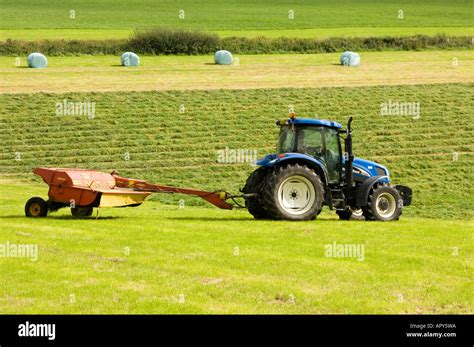 Tractor Cutting Grass Hi Res Stock Photography And Images Alamy