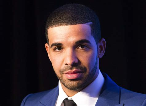 Download Drake performing live on stage | Wallpapers.com