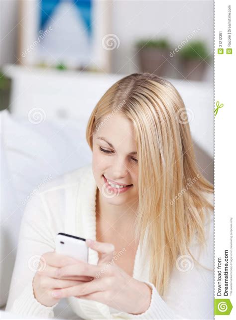 Woman Text Messaging Through Mobile Phone Stock Image Image Of