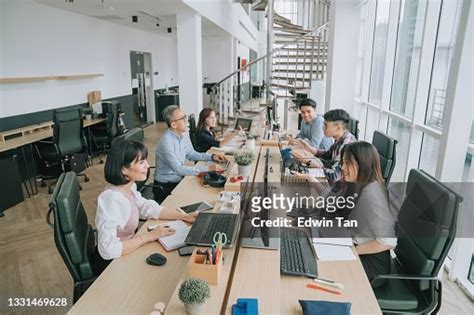 Asian Multiethic White Collar Worker Busy Working And Communicate In