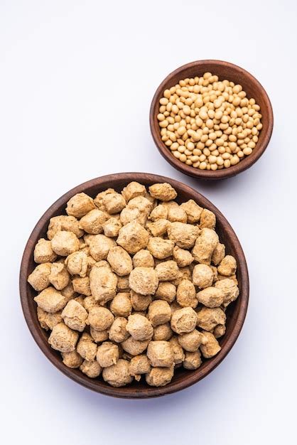 Premium Photo Glycine Max Or Soya Bean Or Uncooked Soybean Chunks