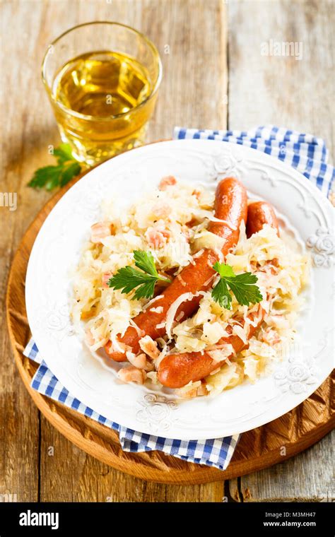 Sauerkraut stew with sausages Stock Photo - Alamy