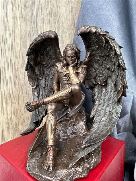 fallen angel lucifer statue