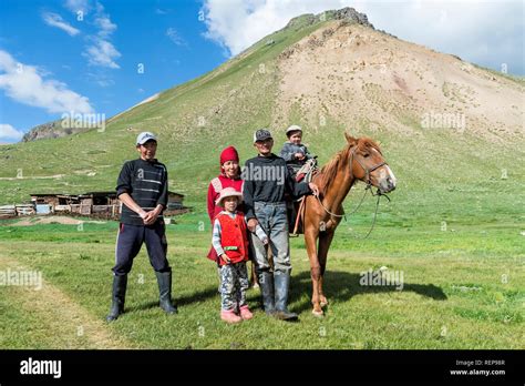 kyrgyz family  horse sary jaz valley issyk kul region kyrgyzstan