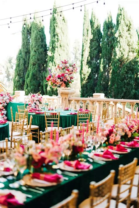 An Image Of A Table Set Up With Flowers And Greenery On The Tables For