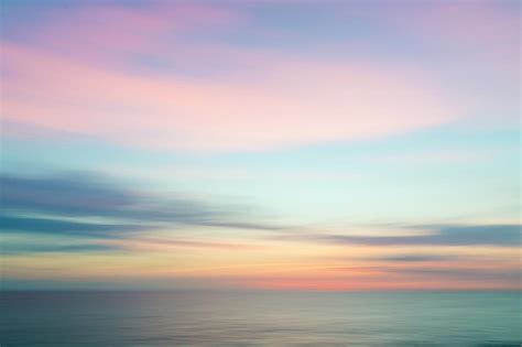 Abstract sunset sky and ocean nature background. Photograph by Irina ...