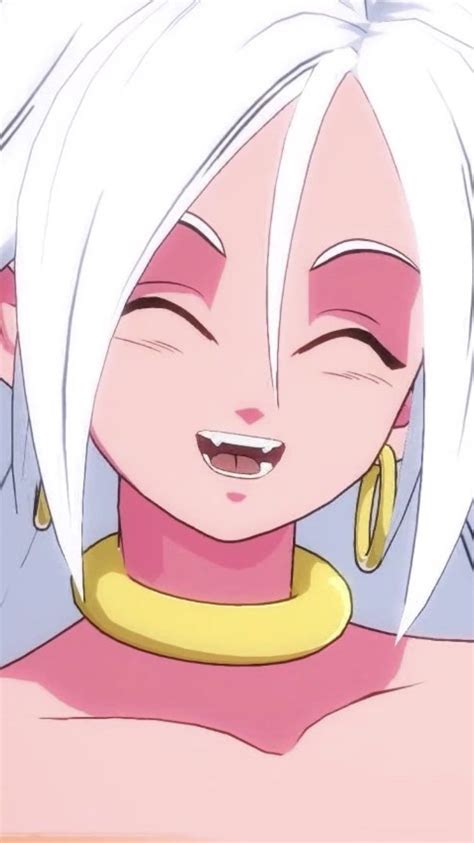 A Close Up Of A Person With White Hair Wearing Earrings And A Pink Top Smiling