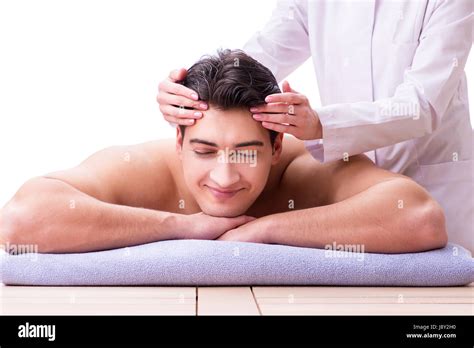 Handsome Man In Spa Massage Concept Stock Photo Alamy