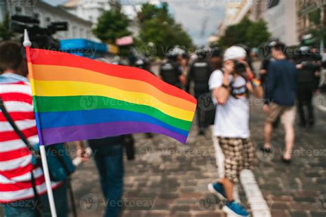 Hand Hold A Gay Lgbt Flag At LGBT Gay Pride Parade Festival Stock Photo At Vecteezy