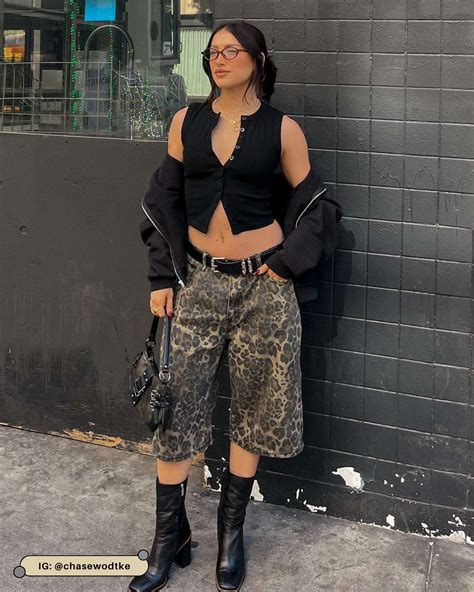 The 16 Best Black Vest Outfit Ideas to Wear Now