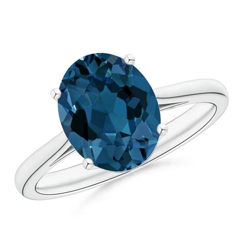 Oval Solitaire London Blue Topaz Cocktail Ring Angara