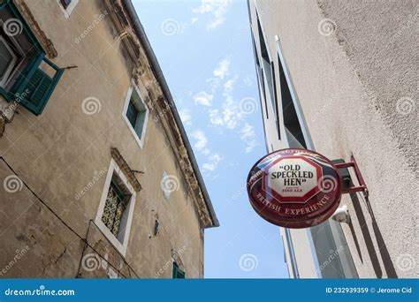 Old Speckled Hen Logo In Front Of Their Local Retailer English Pub In