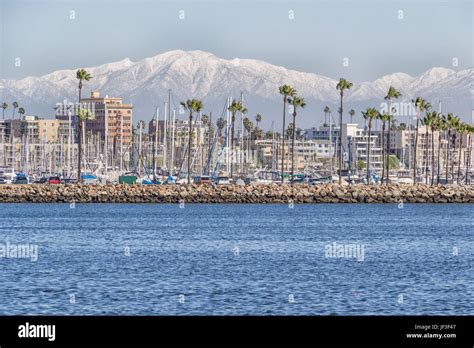 Long Beach California Harbor And Skyline With Snow Capped San