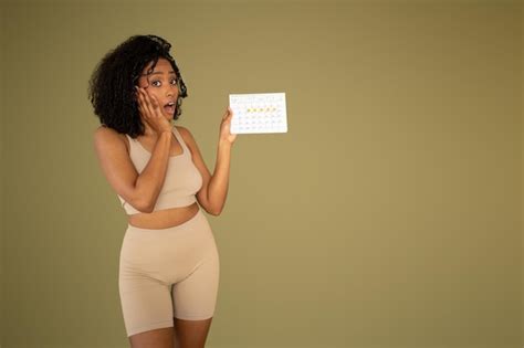 Premium Photo Shocked Scared Millennial Curly African American Lady