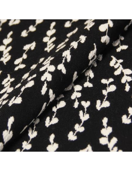 Jacquard Feuillage fond noir blanc cassé vendu au mètre