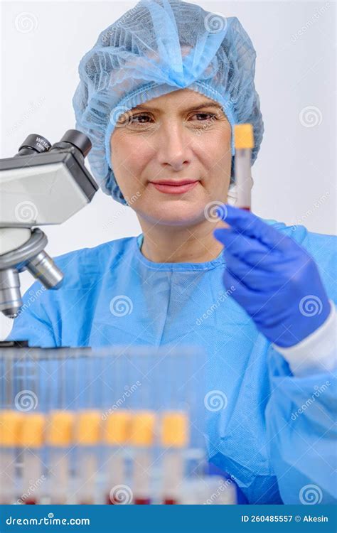 Scientist Or Researher Holding Sample Blood Tube In Laboratory Stock